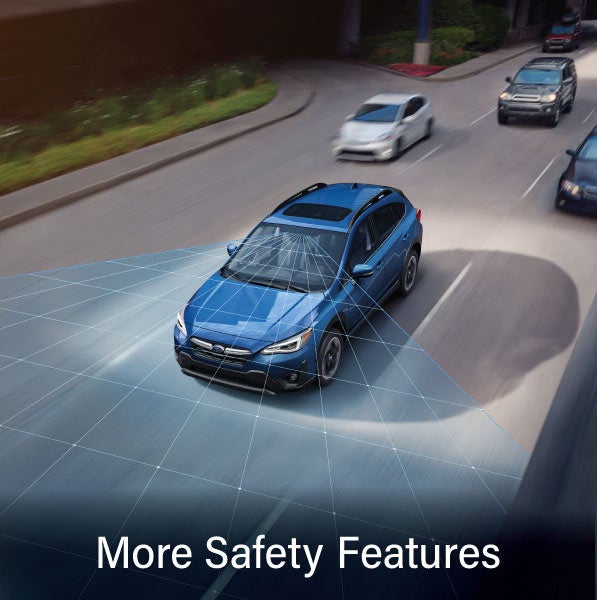 A Subaru Crosstrek in blue with the words “More Safety Features“. | River City Subaru in Huntington WV