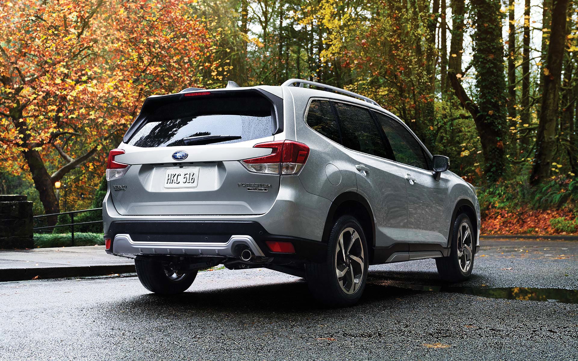 The rear of the 2022 Forester on a neighborhood street. | River City Subaru in Huntington WV